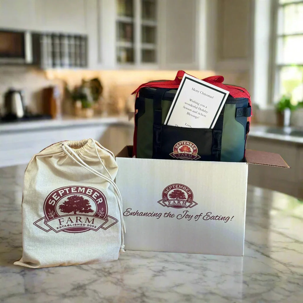 September Farm packaging including a box, bag, and card on a wooden surface.