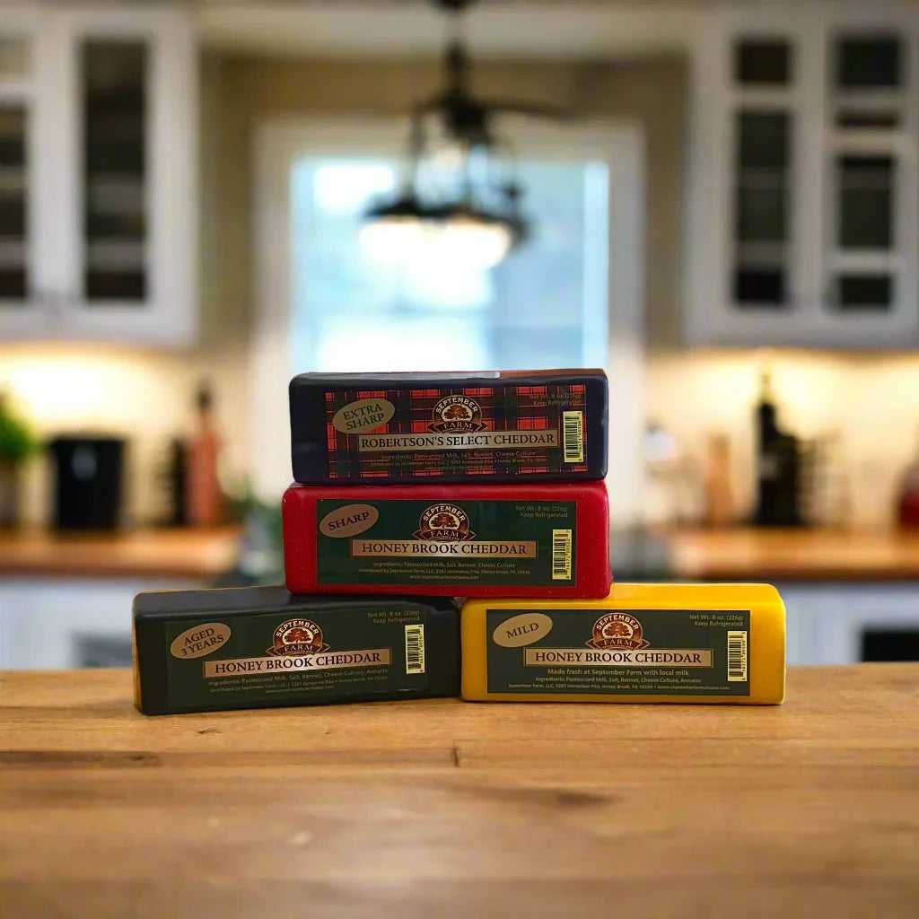 A stack of cheddar blocks